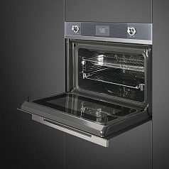 Компактный духовой шкаф с СВЧ Smeg SF4102MCS