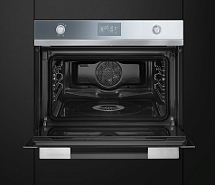 Компактный духовой шкаф с пароваркой Smeg SF4120VC