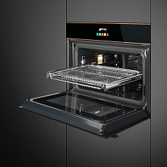Компактный духовой шкаф с функцией СВЧ Smeg SF4604WMCNR