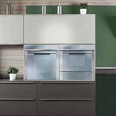 Компактный духовой шкаф с СВЧ Smeg SF4140MC